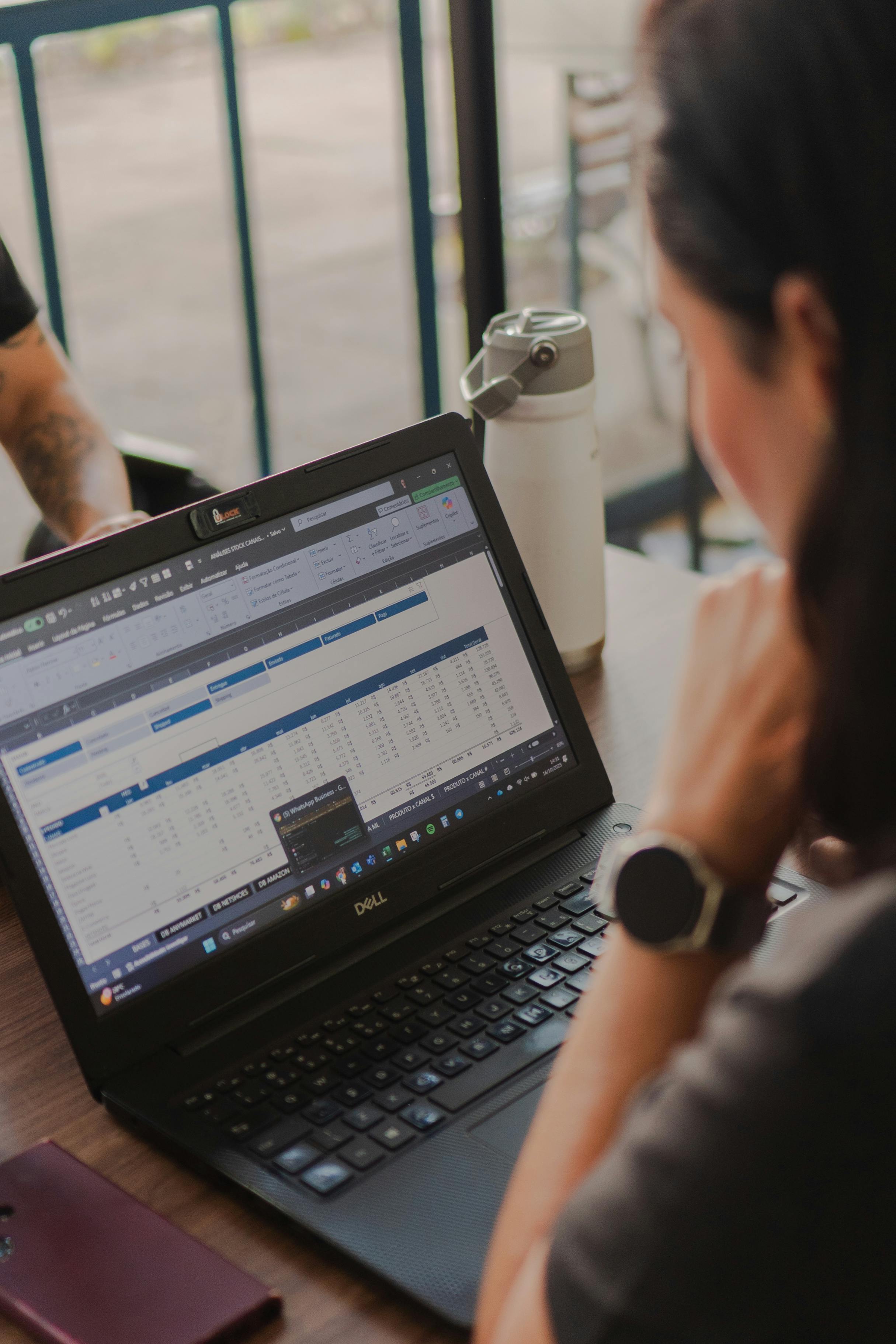 Business owner reviewing financial records